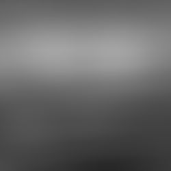 Two Regal Cutting Tools 5/16"-24 NF H3 hand taps placed in front of their original boxes on a shop surface.