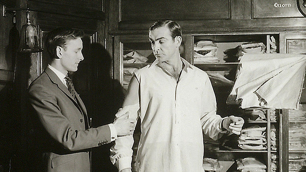 Sean Connery as James Bond being fitted for a shirt