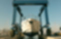 Luxury%20motor%20yacht%20lifted%20by%20a%20special%20crane%20for%20the%20annual%20repair%2