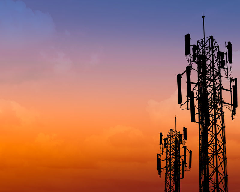 Cell towers at sunset