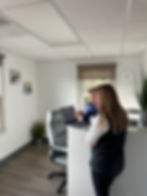 Christina front desk.jpg
