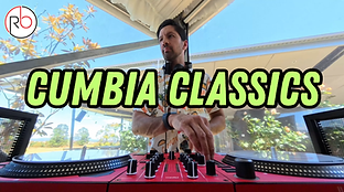 A DJ stands behind red turntables outdoors, mixing music. Large text over the image reads CUMBIA CLASSICS.