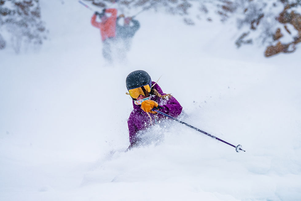 Woman skiing powder