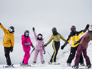 women skiing and snowboarding at Whistler BC