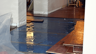 water damage on home floor
