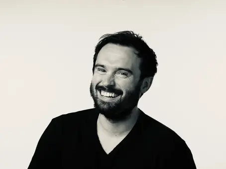 Zach Stoner Posing on White Background