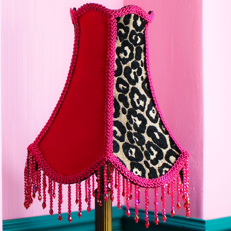 Pink and leopard print lampshade with beaded fringe.