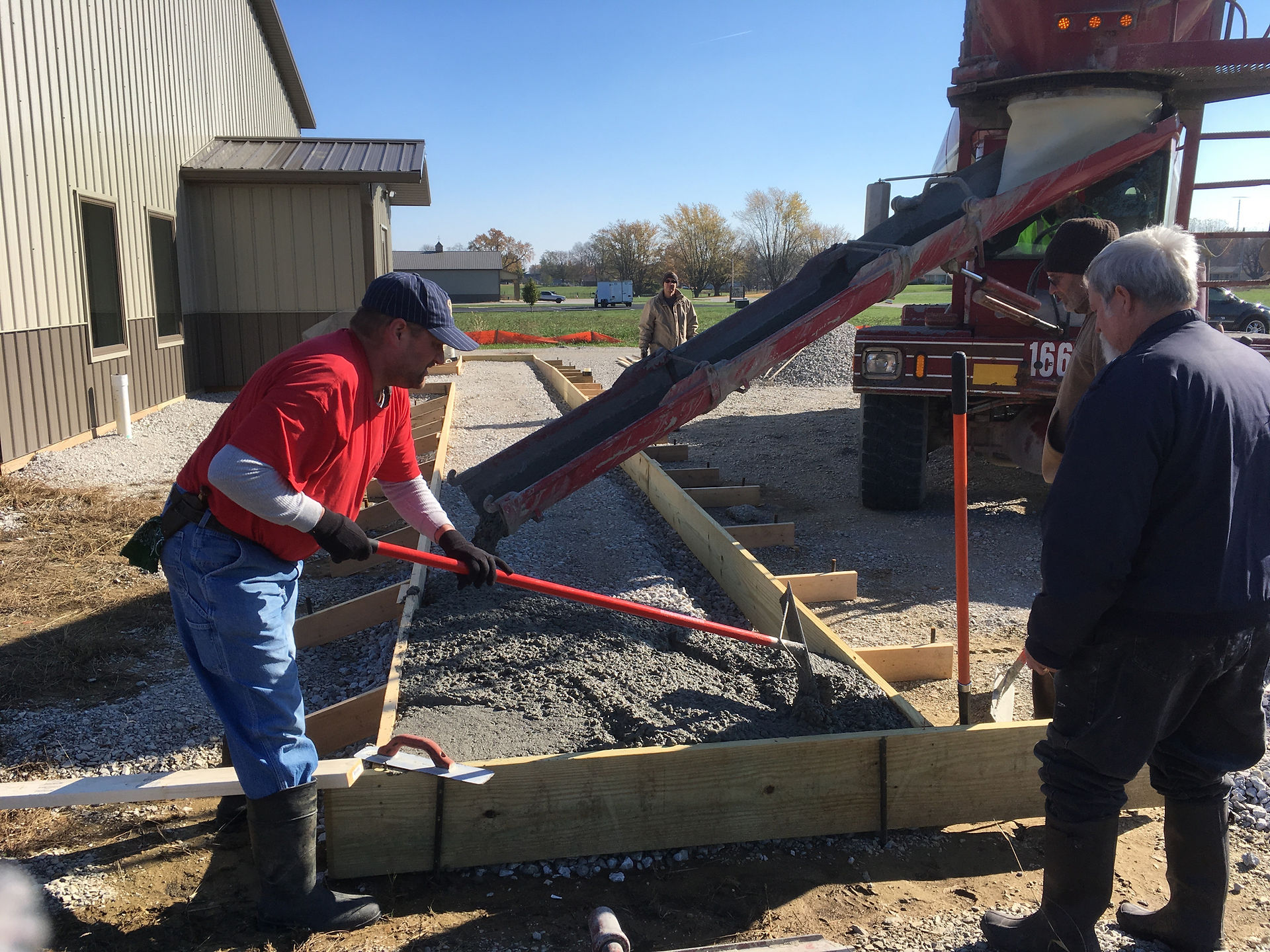 2017_11_09 John pouring concrete sidewalk