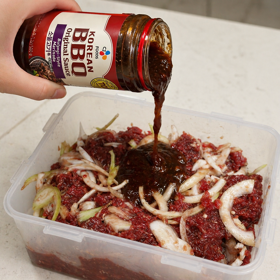 CJ Korean BBQ sauce being poured from the jar into a plastic container of raw marinated beef and sliced onions.
