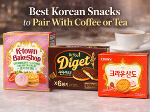 Best Korean Snacks to Pair With Coffee or Tea blog image featuring boxed Korean snack biscuits and crackers, including strawberry cream crackers, chocolate whole wheat biscuits, and sandwich cookies beside a cup of coffee.