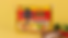Shin Ramyun Gold package on a yellow background with chicken, broccoli, and red pepper ingredients nearby.