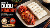 Dubu kimchi served on a beige plate with sliced white tofu, spicy red kimchi, sesame seeds, and bold thumbnail text explaining the Korean tofu-and-kimchi dish.