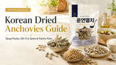 Bright Korean dried anchovies guide thumbnail showing a package of smoked anchovies, bowls of dried anchovies, anchovy strips, soup, rice, and title text about soup packs, stir-fry sizes, and pantry picks.