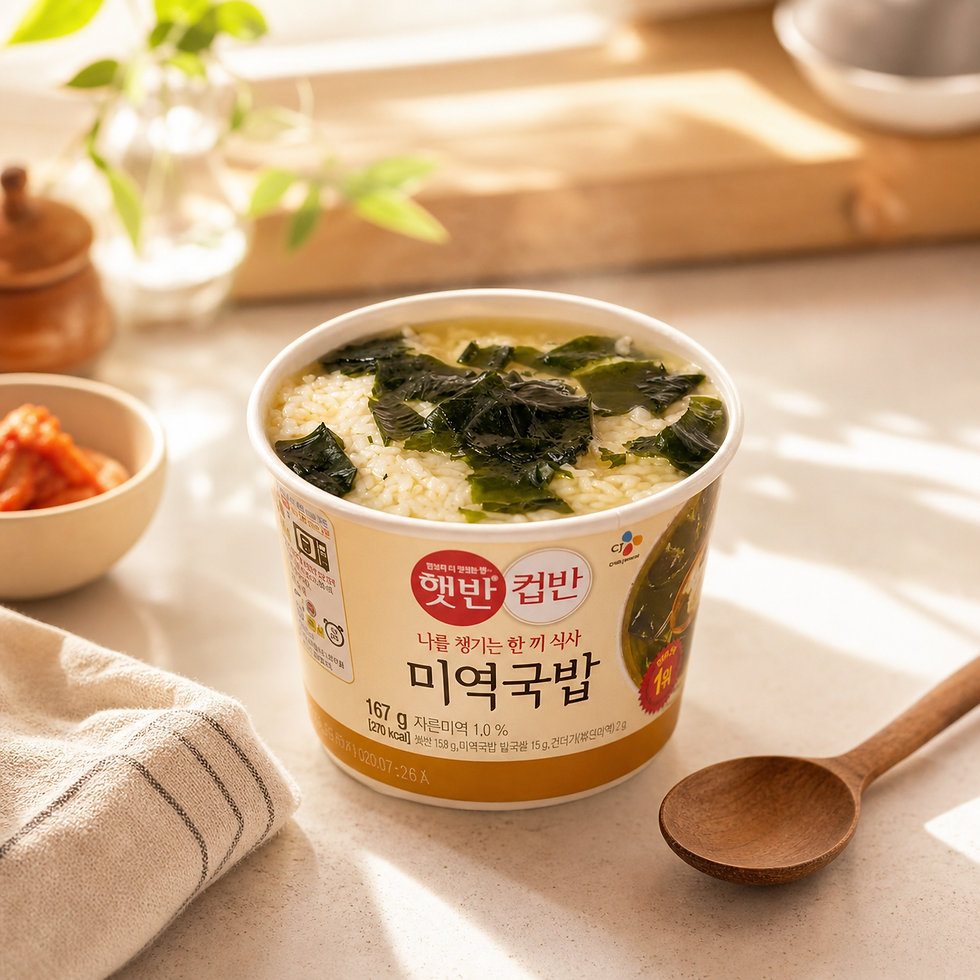CJ Hetbahn Cupban seaweed soup rice cup with seaweed and rice, served in a warm morning Korean kitchen setting with a wooden spoon and soft sunlight.