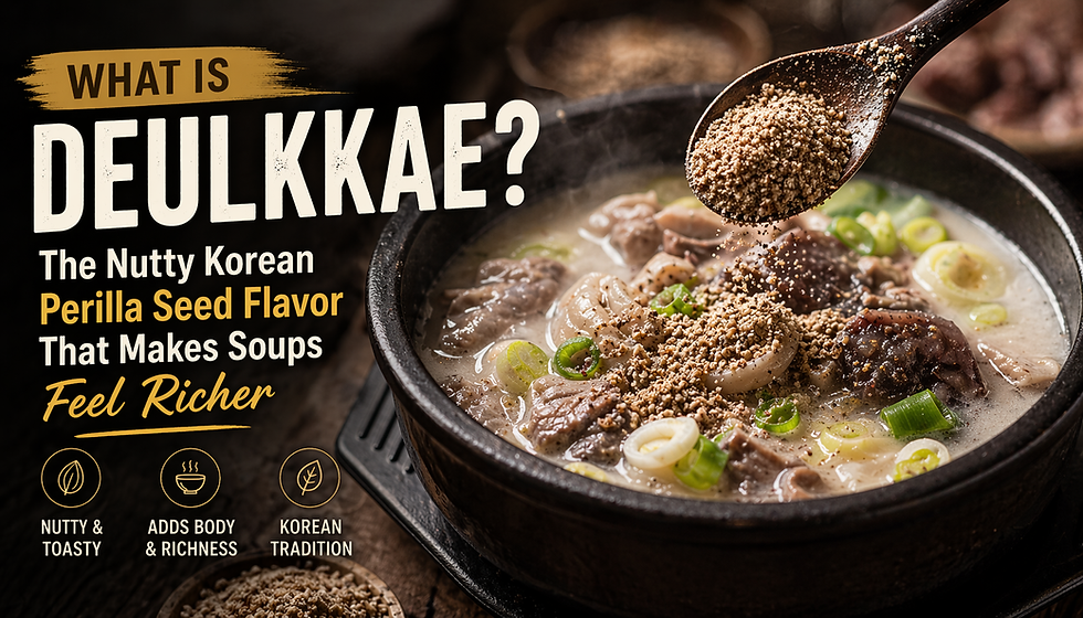 Thumbnail for an article about deulkkae, showing a steaming bowl of Korean gukbap topped with ground perilla seed as a spoon sprinkles more over the soup. Large headline text reads, “What Is Deulkkae? The Nutty Korean Perilla Seed Flavor That Makes Soups and Noodles Feel Richer.”