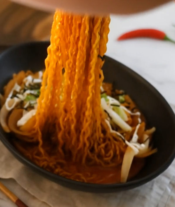 Eating Samyang Spicy Chicken Ramen with york
