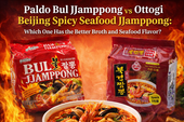 Premium comparison thumbnail with fiery red background showing Paldo Bul Jjamppong on the left and Ottogi Beijing Spicy Seafood Jjamppong on the right, with a steaming bowl of spicy seafood noodle soup in the center. Large headline text reads, “Paldo Bul Jjamppong vs Ottogi Beijing Spicy Seafood Jjamppong: Which One Has the Better Broth and Seafood Flavor?”