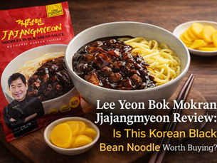 Lee Yeon Bok Mokran Jjajangmyeon review thumbnail with the red package, a bowl of glossy Korean black bean noodles, one piece of danmuji, and headline text asking if it is worth buying.