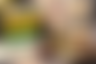 Premium blog thumbnail showing a Korean soy milk drink Vegemil B being poured into a glass beside a soy milk bottle, with a glass of black coffee, coffee beans, and wooden spoons on a styled tabletop. Large headline text reads “Korean Soy Milk Drinks Worth Trying,” with smaller text: “The Ones People End Up Rebuying for Busy Mornings.”