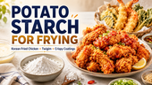 Wide landscape thumbnail titled “Potato Starch for Frying,” showing a bright kitchen scene with a bowl of white potato starch, crispy Korean fried chicken, and assorted twigim-style fried vegetables and shrimp. The design highlights Korean fried chicken, twigim, and crispy coatings with bold navy and gold title text on a clean, commercial food-blog layout.