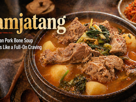 Steaming bowl of gamjatang, a Korean pork bone soup with tender pork, potatoes, and greens in a rustic earthenware pot, with kimchi in the background and the headline “Gamjatang: The Korean Pork Bone Soup That Feels Like a Full-On Craving.”