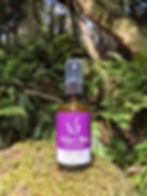 Vida Olea Deep Sleep Pillow Spray in a forest setting.