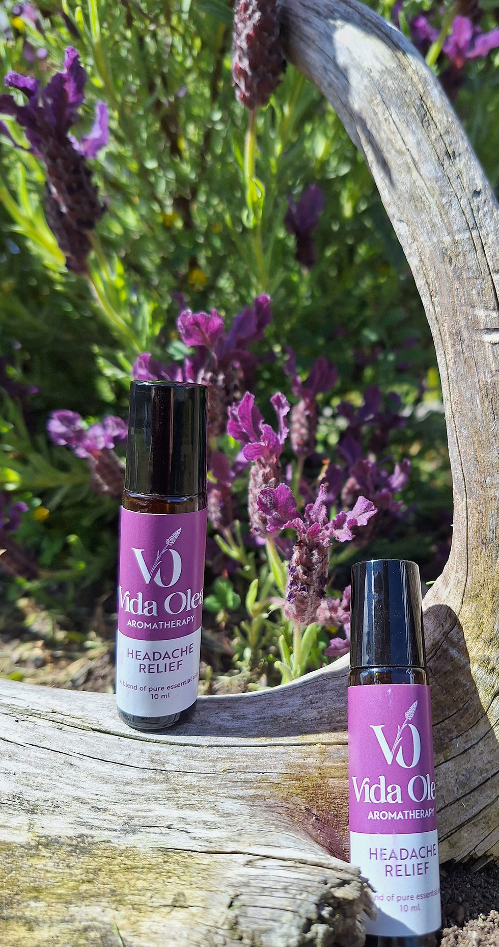 Headache Relief Roll-on product with lavender flowers in the background.
