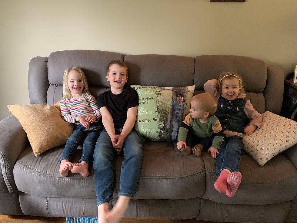 Getting creative when taking a picture of ALL my kids.