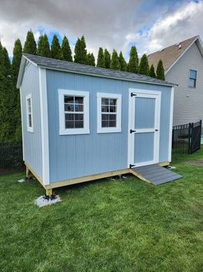 Small light blue shed