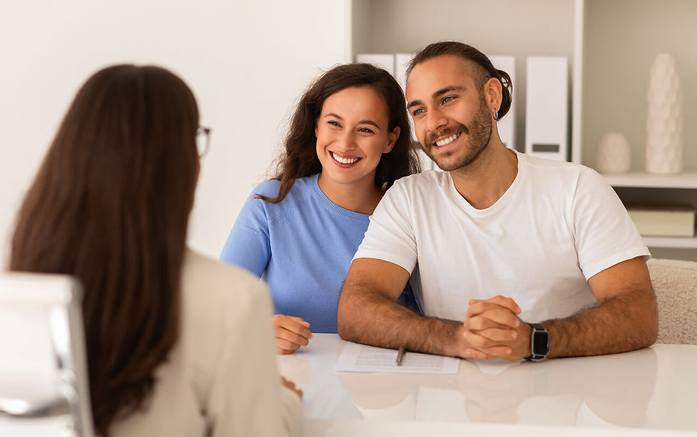 woman-doctor-young-couple-talking-office-clinic 1 (1).jpg