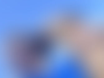 Dr Jen receives kisses from a grateful dog