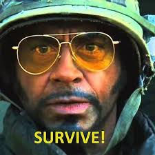 Robert Downey Junior telling Ben Stiller to survive. Its relative to crypto news because of a market crash.