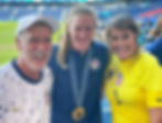 Keeper Alyssa Naeher with her parents John and Donna right after the U.S. women won Olympic gold — in Parc des Princes stadium in Paris 