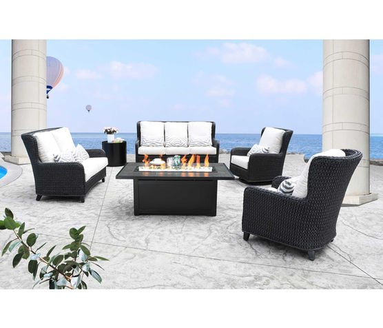 Resin wicker outdoor seating set with sofa, chairs, and loveseat.
