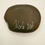 Thumbnail: Back side of hand-painted mandala stone with natural stone surface and artist signature.