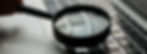 Magnifying glass over keyboard