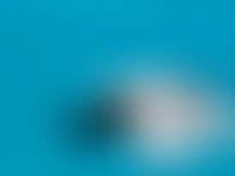 A person buried under a pile of documents