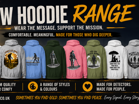 Wide promotional banner for the new Signals of Hope Detecting hoodie range featuring multiple hoodie designs displayed against a dramatic sunset detecting scene. The banner includes slogans such as “Wear the Message. Support the Mission.” and highlights mental health awareness, with 10% of sales donated to Mind. Rustic black and gold styling with colourful hoodie artwork and metal detecting themes throughout.