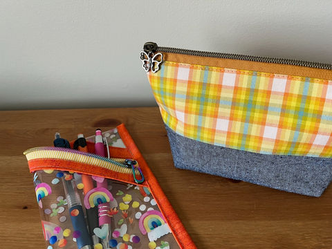Open Wide Pouch and vinyl pencil pouch.