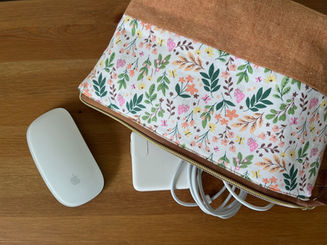 Open Wide pouch on its side with computer mouse and cord.