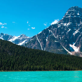 Lake and mountains with blue sky