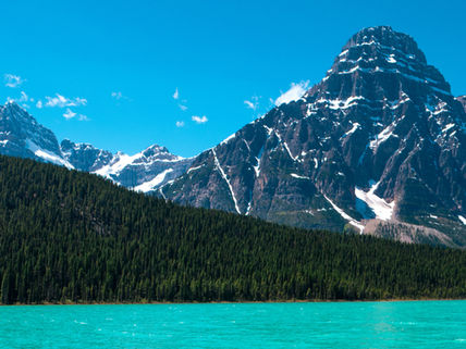 Lake and mountains with blue sky