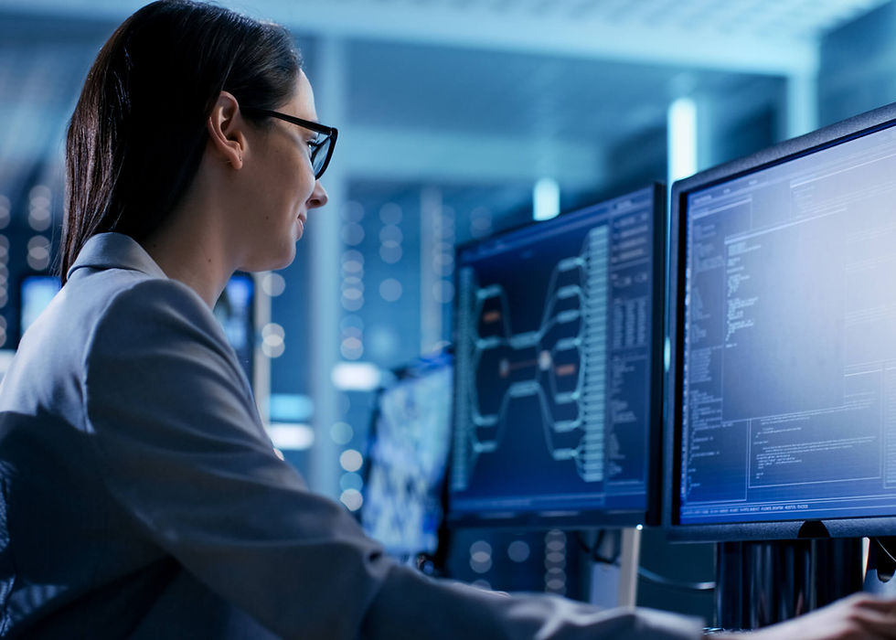 A white hat hacker woman at a computer featuring a coding program