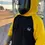 Thumbnail: Welder wearing a black and yellow hoodie with protective gear on a job site