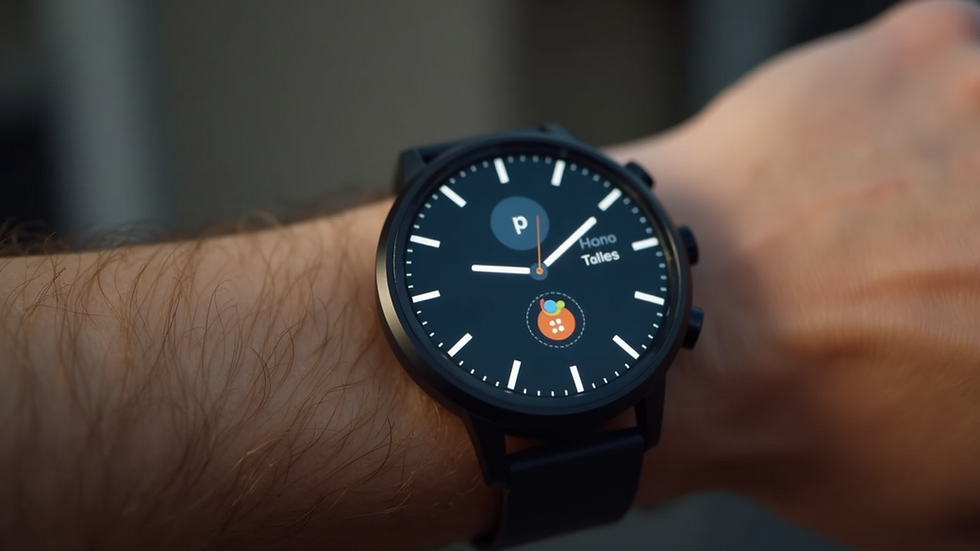 Close-up view of a smartwatch displaying Google Assistant interface