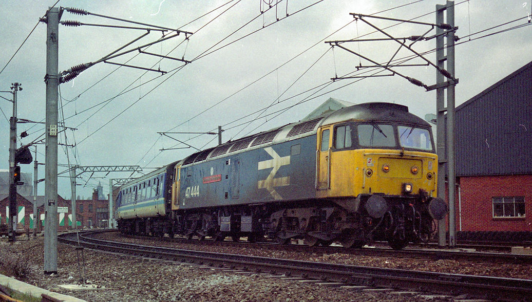 Class 47 No 47444 'County of Nottingham' heads a Trans Pennine Express from Liverpool to Newcastle through the Holbeck Triangle at 14.51 on 24 February 1990.