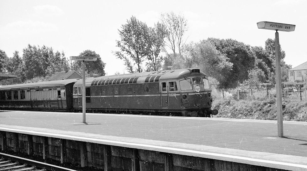 BRCW Class 2 No D5318 (more familiar in Scotland as Class 26) pauses with a stopping northbound semi-fast at Potters Bar on 19 July 1959.