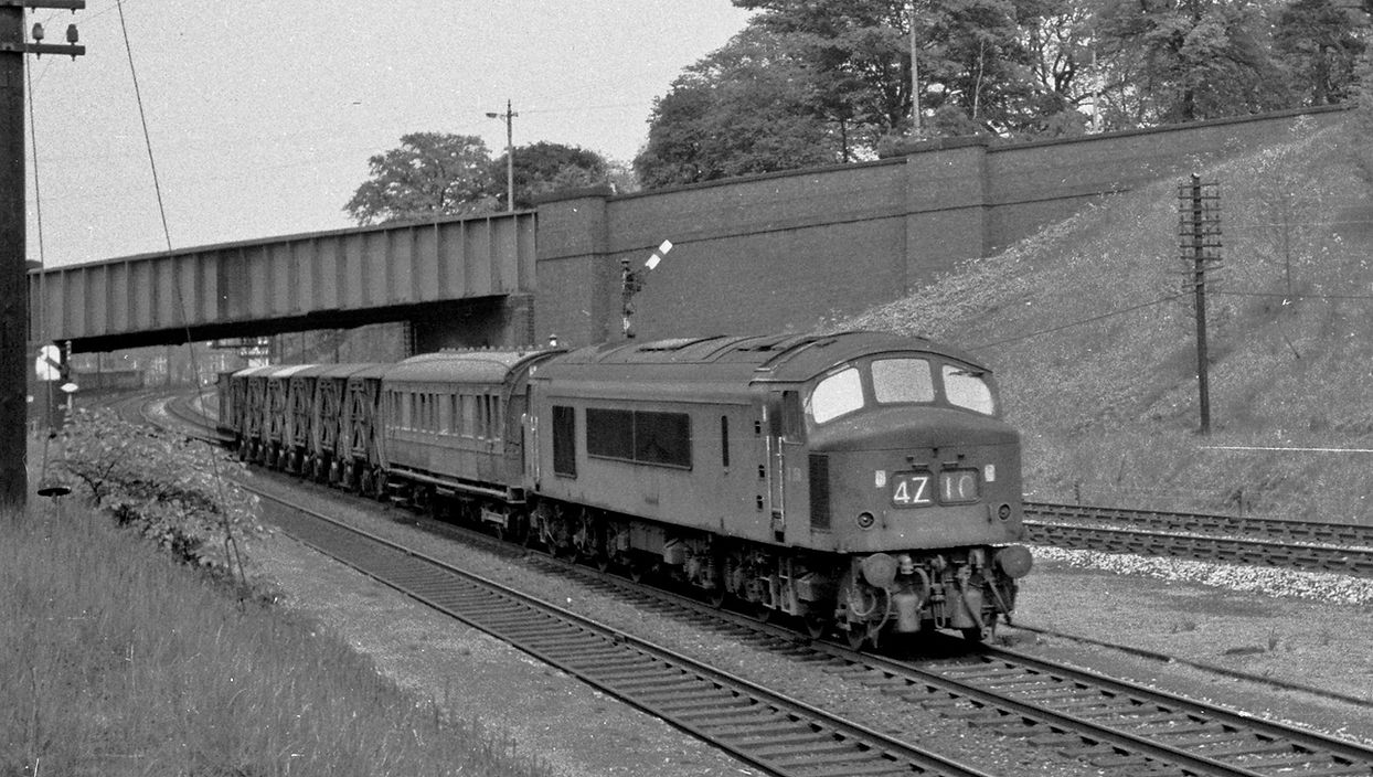 13:38 A Class 4 express freight powered by BR Type 4 No D159 heads south from Leicester towards Knighton Tunnel on 28 May 1963..