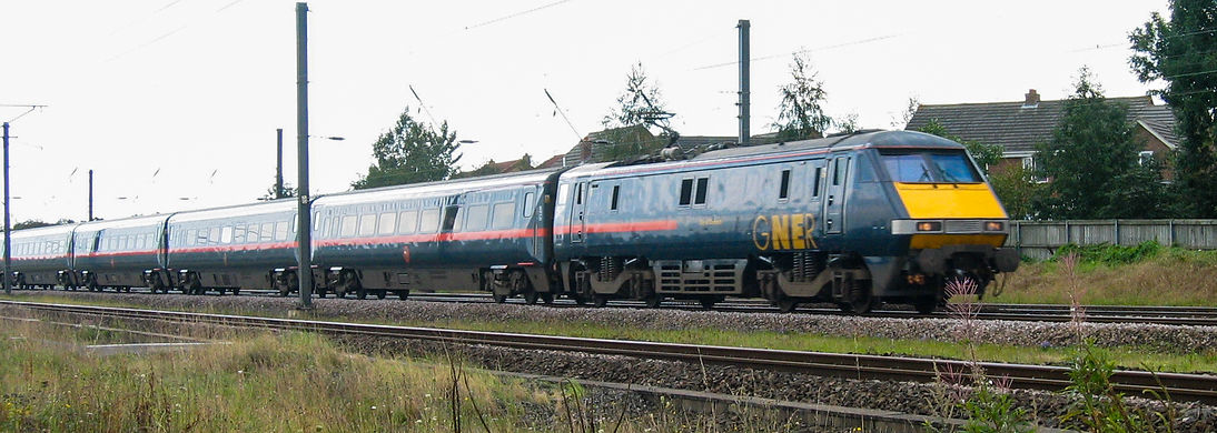 A GNER InterCity 225 headed by and unidentified Class 91 heads north through Copmanthorpe towards York at 14:40 on 31 August 2004.