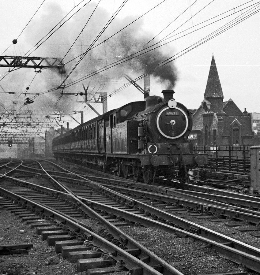LNER N7/5 0-6-2T No 69671 storms to the top of Bethnal Green bank on 15 April 1960.